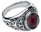 Prsten s tmavým rubínově červeným kamínkem